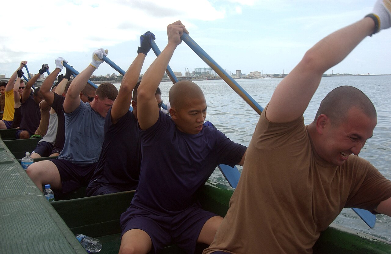 US Navy 070425-N-4198C-002 Personnel Specialist 1st Class Omar Saliba and Hospital Corpsman 1st Class Ryan De La Cruz lead the men's Navy rowing team.jpg