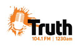Radio microphone surrounded by an orange splatter and test reading "Truth 104.1 FM & 1230 AM"