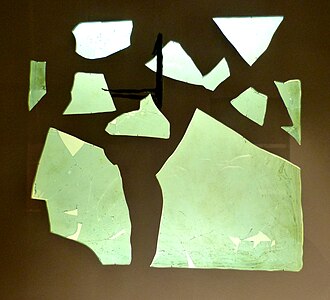 Fragment of a Roman window glass plate dated to 1st to 4th century CE. Note the obvious curvature; this is not a flat pane