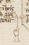 a fingernail stretches about four times the length of hand to point several rows into the text