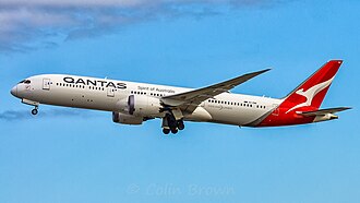 A Boeing 787-9 Dreamliner with Qantas livery in flight