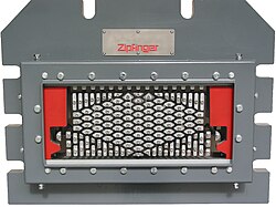 Extrusion die tool assembly showing detailed tooling structure.