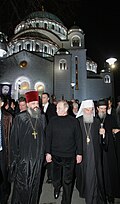 Vladimir Putin in front of the Church of Saint Sava