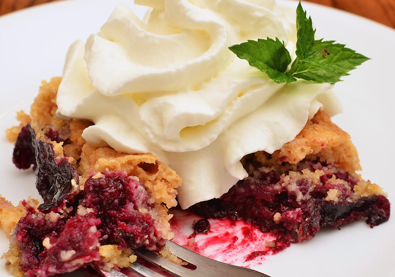 Blackberry dump cake with whipped cream.jpg