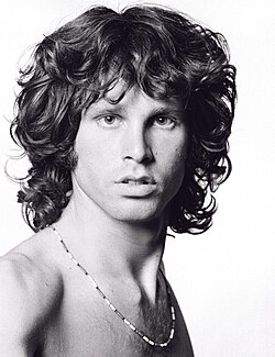 Photograph of Jim Morrison looking into the camera