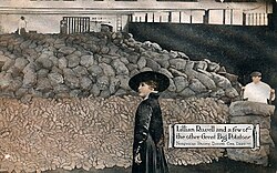 Hollywood star Lillian Russell shows off the Northern Pacific Railway's potatoes in this 1915 promotional postcard.