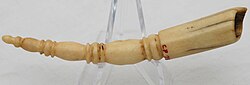 An ivory powder measure from the collection of Conner Prairie