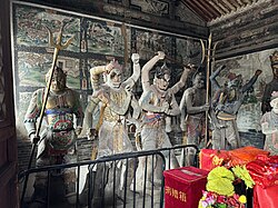 Liao dynasty (916-1125) statutes of four of the Eight Wisdom Kings and an attendant warrior at Datong Guanyin-tang[zh], Datong, Shanxi, China. From left to right: Padanakṣipa, Acala, Yamāntaka, Aparājita