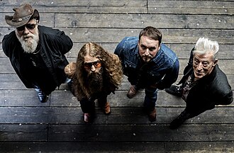 Atomic Rooster in 2025 (from left to right) Shug Millidge, Adrain Gautrey, Paul Everett and Steve Bolton