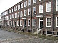 A row of brick-built terraced houses