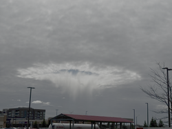 A fallstreak hole observed over Ottawa, Canada on May 8, 2026.