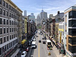 Manhattan's Chinatown, the largest concentration of Chinese people in the Western Hemisphere and one of nine Chinatown neighborhoods in New York City, as well as one of twelve in the surrounding New York metropolitan area