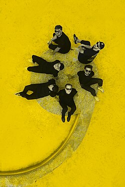 Happysad in 2026 Clockwise, From top: Jakub Kawalec, Łukasz Cegliński, Michał Bąk, Artur Telka, Jarosław Dubiński, Maciej Ramisz