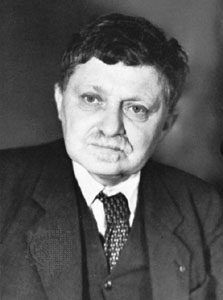 Black-and-white head shot of Marcel