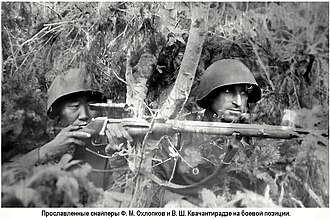 Famous Soviet sniper duo Fyodor Okhlopkov and Vasilij Kvachantiradze use a Mosin-Nagant sniper rifle with PU scope