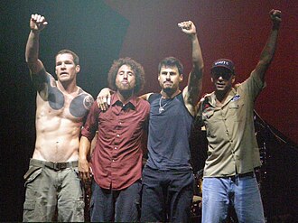 Rage Against the Machine at Sam Boyd Stadium in 2007. From left: Tim Commerford, Zack de la Rocha, Brad Wilk, and Tom Morello