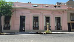 Façade of a typical "Casa Chorizo" house with different ornaments and colors in Buenos Aires (Argentine)