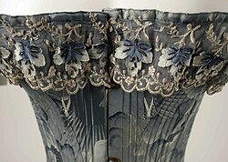 Closeup of lace details on an American corset circa 1878