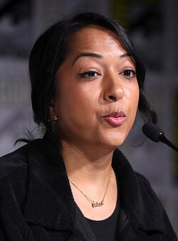 Picture Sana Amanat speaking at the Women of Marvel panel during San Diego Comic-Con 2023.