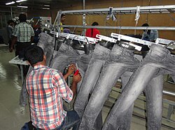 Tacking on jeans, which adds strength to high-stress areas