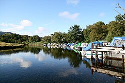 boats by a river bank