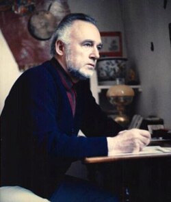 Breyer sitting at his desk