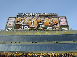 A photo of the part of Lambeau field that shows all of the Packers' retired numbers and player names.