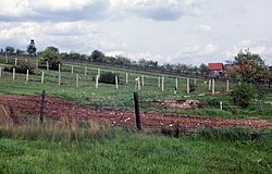 The newly strengthened border in 1962 in the Eichsfeld region, with barbed-wire fences, watchtowers and minefields