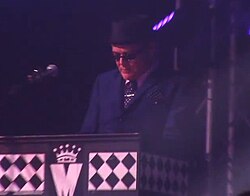 Barson performing live with Madness in 2017