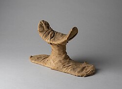 Headrest wrapped in linen