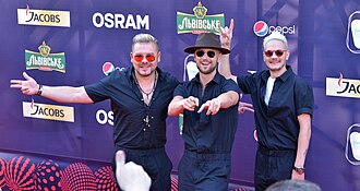 SunStroke Project at the red carpet ceremony for the Eurovision Song Contest 2017. From left to right: Sergey Stepanov, Sergei Yalovitsky and Anton Ragoza