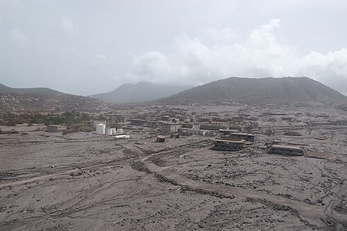 Aerial view of Plymouth, Montserrat, buried under grey volcanic ash