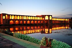 Khaju Bridge at twilight, with arches illuminated