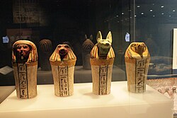 Complete set of canopic jars decorated with hieroglyphics; 744–656 BC; painted sycomore fig wood; various heights; British Museum (London)