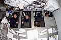 Mission STS-107 crew in bunk beds on the middeck of the Space Shuttle.