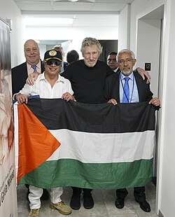 Waters with the Palestinian flag, alongside Colombian president Gustavo Petro, in New York