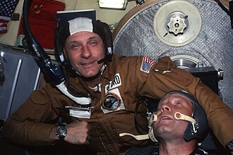 NASA Astronaut Tom Stafford wearing "Snoopy" cap with Plantronics (SPENCOM) headset for Apollo–Soyuz in 1975