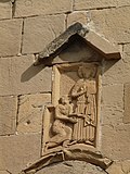 A 7th-century bas-relief from the Monastery of the Holy Cross at Mtskheta, Georgia. It depicts the 7th-century Georgian prince Adarnase praying before Jesus Christ.