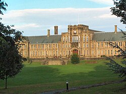 long, grand sandstone building