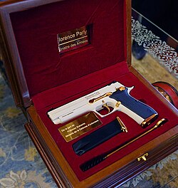 A Pindad G2 Elite with white and gold finish, presented by the Indonesian Minister of Defense to the French Minister of the Armed Forces.[31]