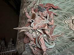 Yuan dynasty (1271-1368) figure of a Wisdom King, one out of a pair flanking a central figure of Guanyin, at Fusheng Temple[zh] in Yuncheng, Shanxi, China