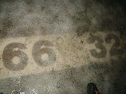 Arctic Circle line 66° 32′ 35″ in Santa Claus Village, Finland