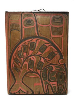 Painted wooden box drum (kóok gaaw) from the late 19th century, decorated with a stylized sea wolf (orca) design in black, red, and brown pigments.