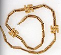 A swastika necklace excavated from Marlik, Gilan province, northern Iran, circa 1,200–1,050 BCE