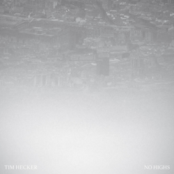 A high-up and monochrome view of a foggy urban city taken upside down, with the text "TIM HECKER" and "NO HIGHS" in the bottom corners.