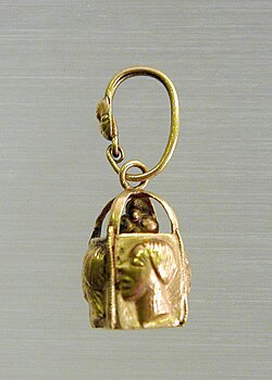 Earring from a pair, each with four relief faces; late fourth–3rd century BC; gold; overall: 3.5 x 0.6 cm; Metropolitan Museum of Art