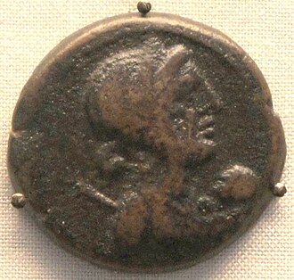 A coin depicting Cleopatra VII with her son Caesarion as an infant, British Museum.[29]