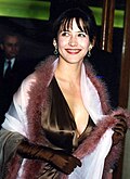 Actress Sophie Marceau wearing evening gloves, 1996.