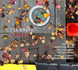 A photograph of Autumn leaves on paving blocks with the album's artist and title on the center/left, and the musician's names on the lower right