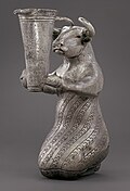 Proto-Elamite kneeling bull holding a spouted vessel; 3100–2900 BC; 16.3×6.3×10.8 cm; Metropolitan Museum of Art (New York City)